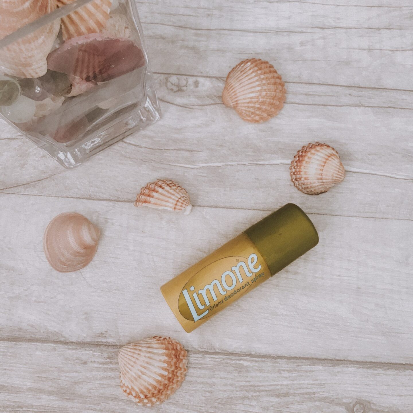 Dealing with ostomy odour | Limone ostomy spray sat on shells