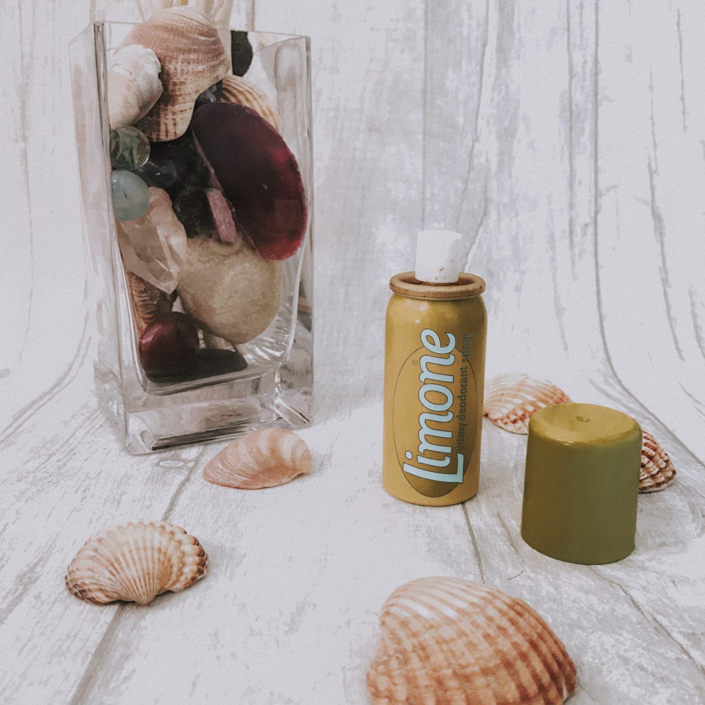 Dealing with ostomy odour | Limone ostomy spray sat on shells