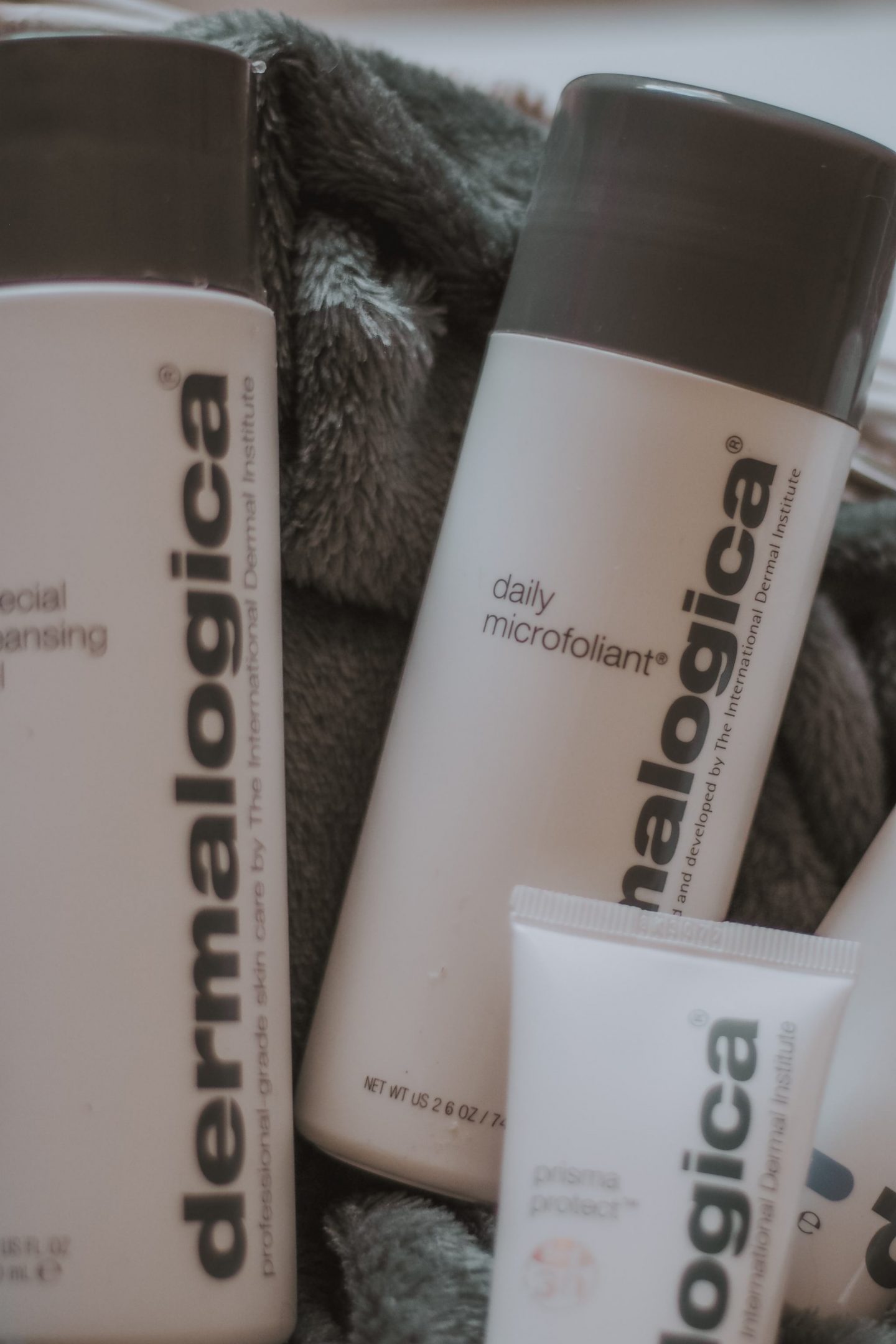 Daily sensitive skincare routine | Range of dermalogica products in white basket with white background