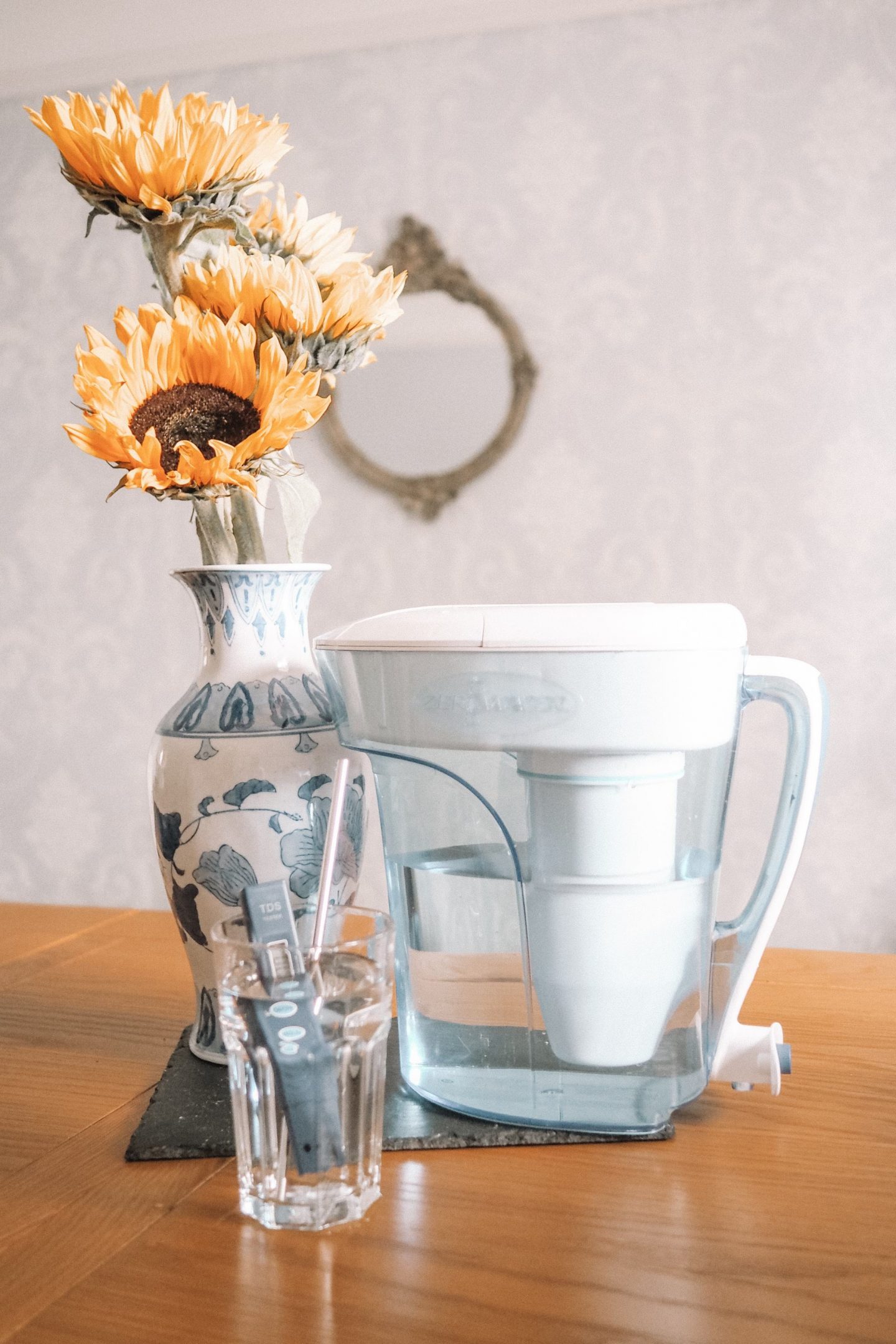 How to keep yourself hydrated with a stoma | The ZeroWater 12 cup filter jug with a glass of water and sunflowers