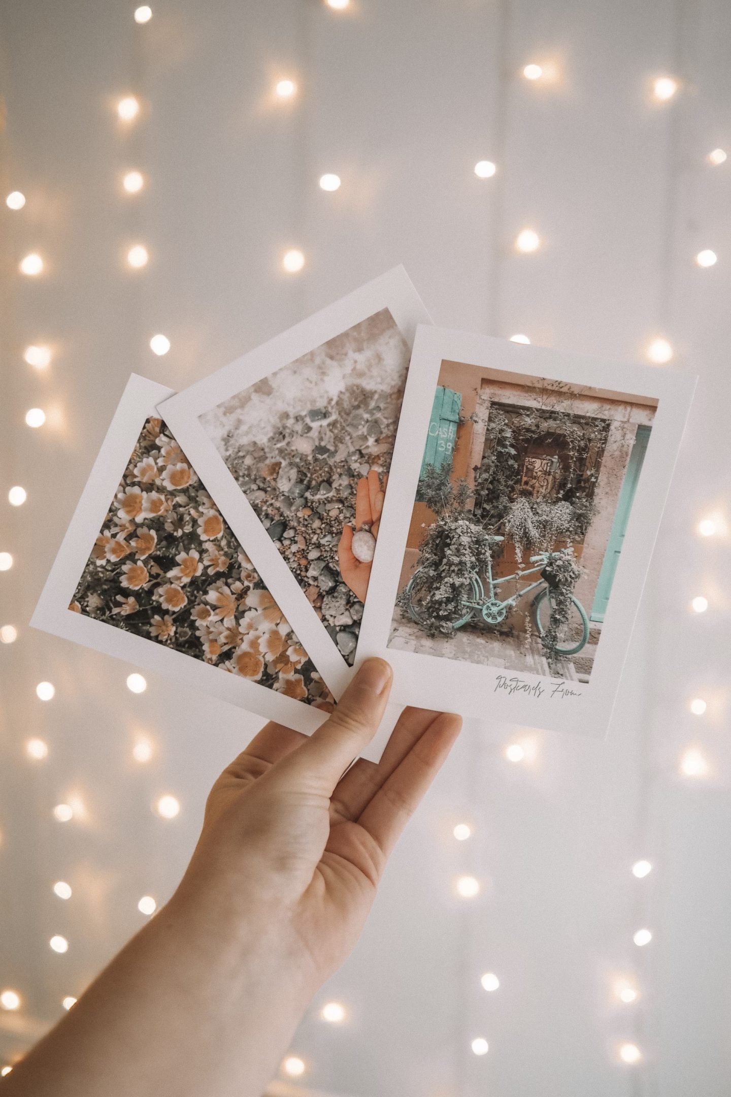 Postcards From InvisiYouth Collection; Three postcards infant of a blurred fairylight wall