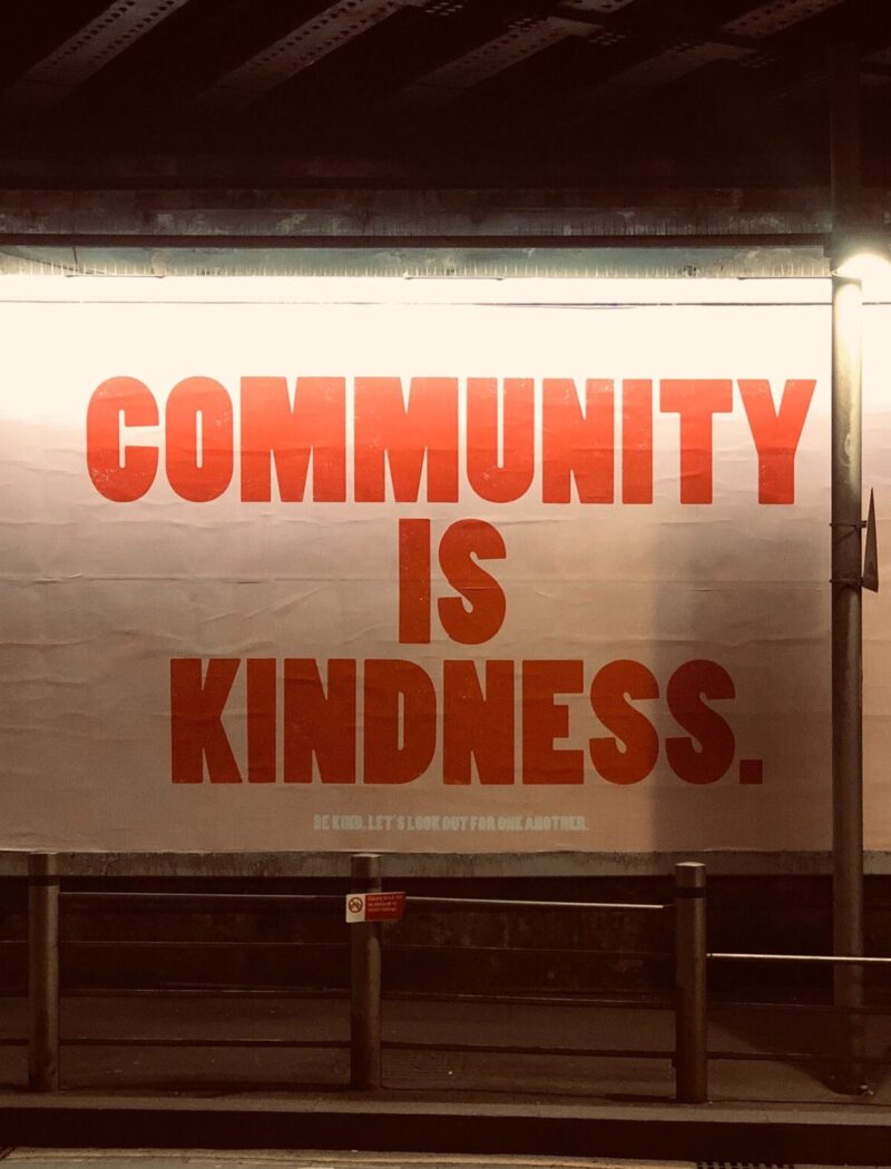 Big sig saying "community is Kindness"